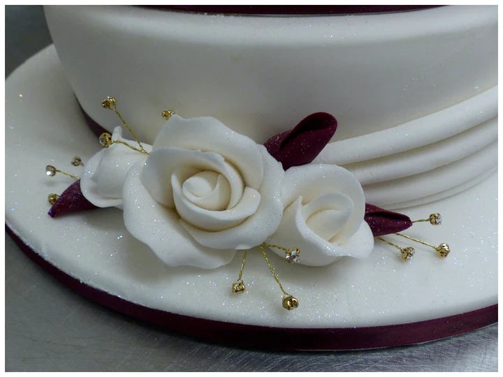 Two Tier Swags and Roses Celebration Cake