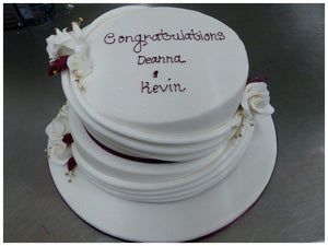 Two Tier Swags and Roses Celebration Cake