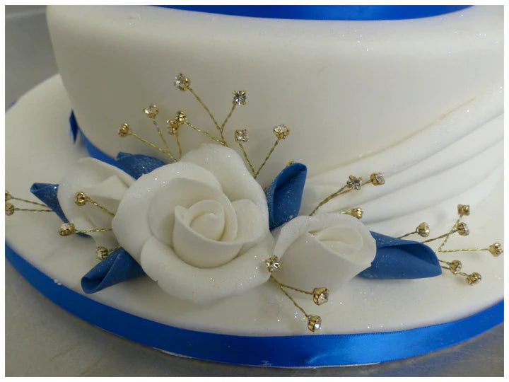 Two Tier Swags and Roses Celebration Cake