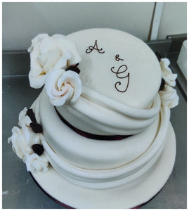 Two Tier Swags and Roses Celebration Cake